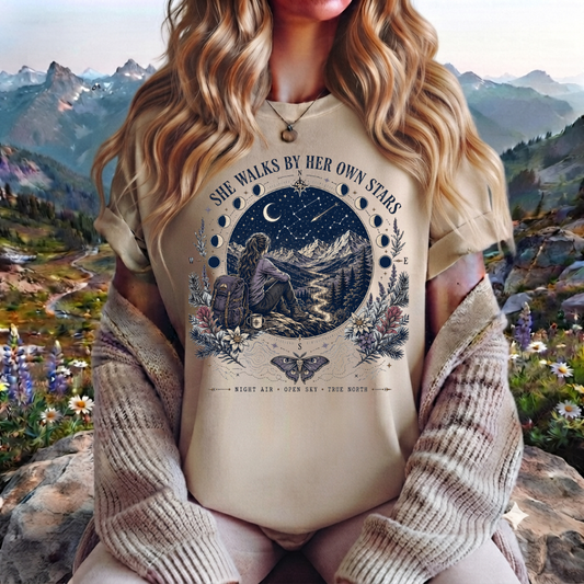 She Walks By Her Own Stars T-Shirt — Night Sky Adventure Graphic Tee